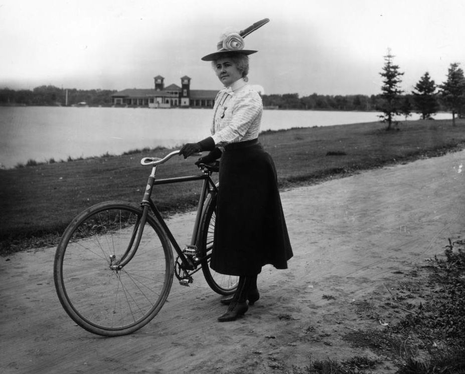 Woman Bicycling in City Park, Denver